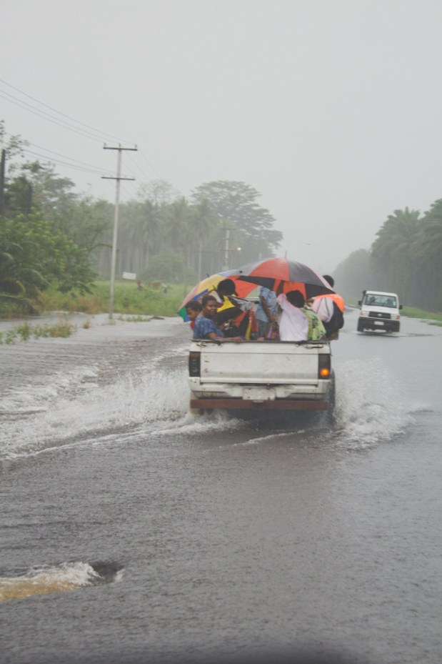 Trying to keep dry at the back of the vehicle 